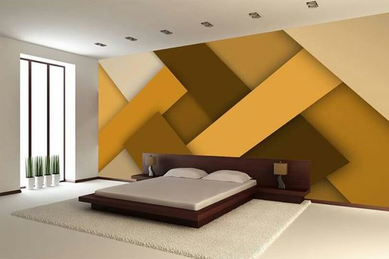 Living room with a bold accent wall painted using a creative color design.